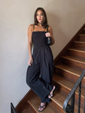A La Mode Smocked Jumpsuit - Stitch And Feather