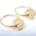 Ban Chiang Solar Discs in Brass from Diablo Organics in yellow brass