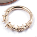 Barbed Wire Seam Ring in Gold from Tawapa in yellow gold