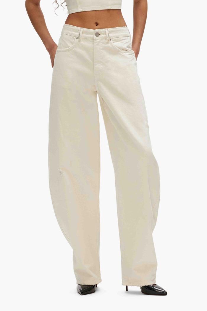 Barrel Fit Jean denim with high rise and wide leg, featuring four pockets and zip-fly closure.