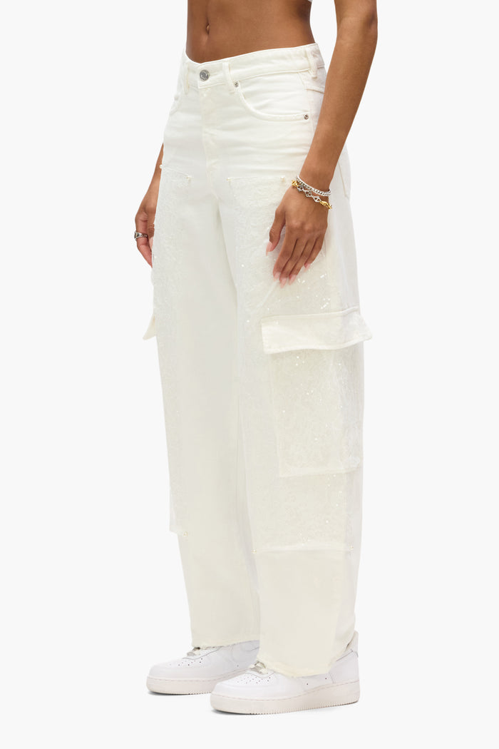 Barrel Lace Carpenter denim with sequin lace panels and cargo pockets, sizes 24 to 34.