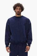Basic Crewneck Sweater in navy with oversized fit and dropped shoulder design.
