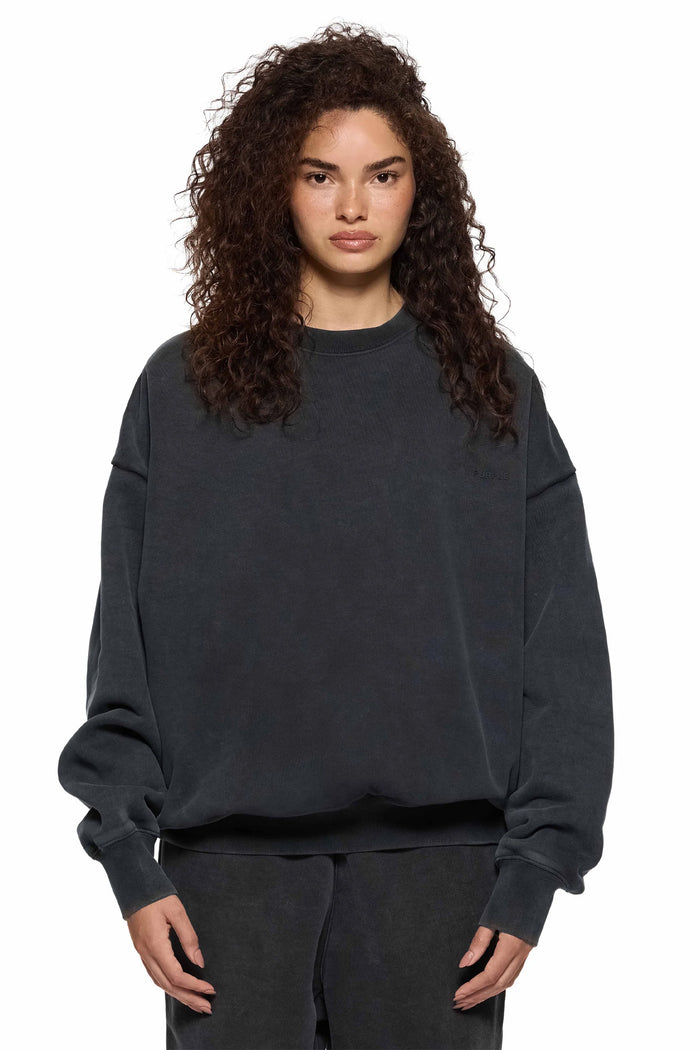 Basic Crewneck Sweater in washed black, oversized fit, made of 100% cotton fleece knit.