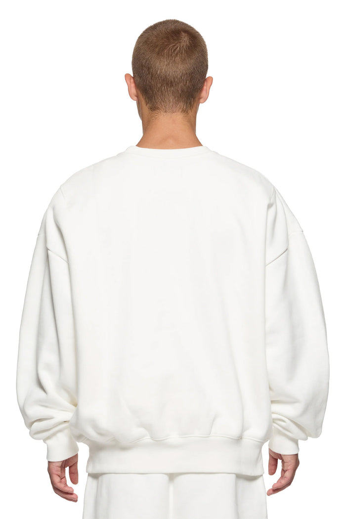Basic Crewneck Sweater in Ivory, oversized fit with dropped shoulder and Basics logo.