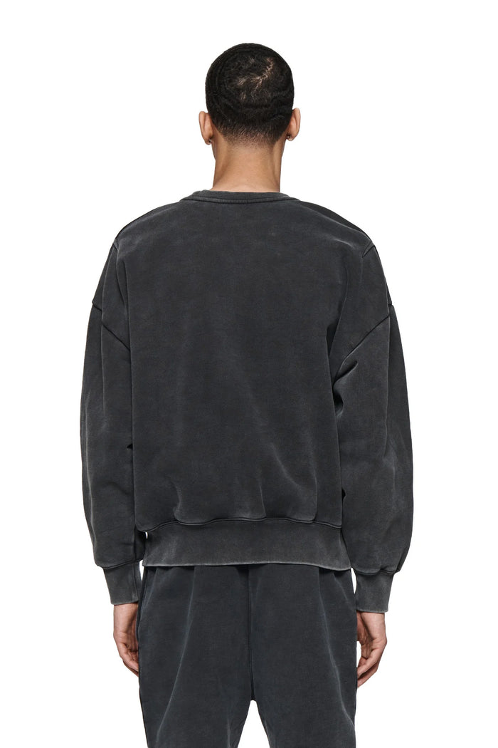 Basic Crewneck Sweater in washed black, oversized fit with dropped shoulder and fleece knit.