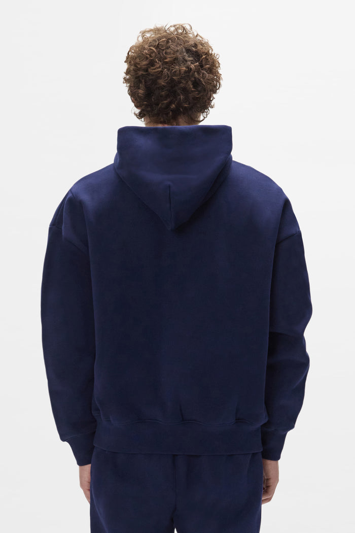 Basic Hoodie in Navy, oversized fit, 100% cotton, heavyweight fleece knit.