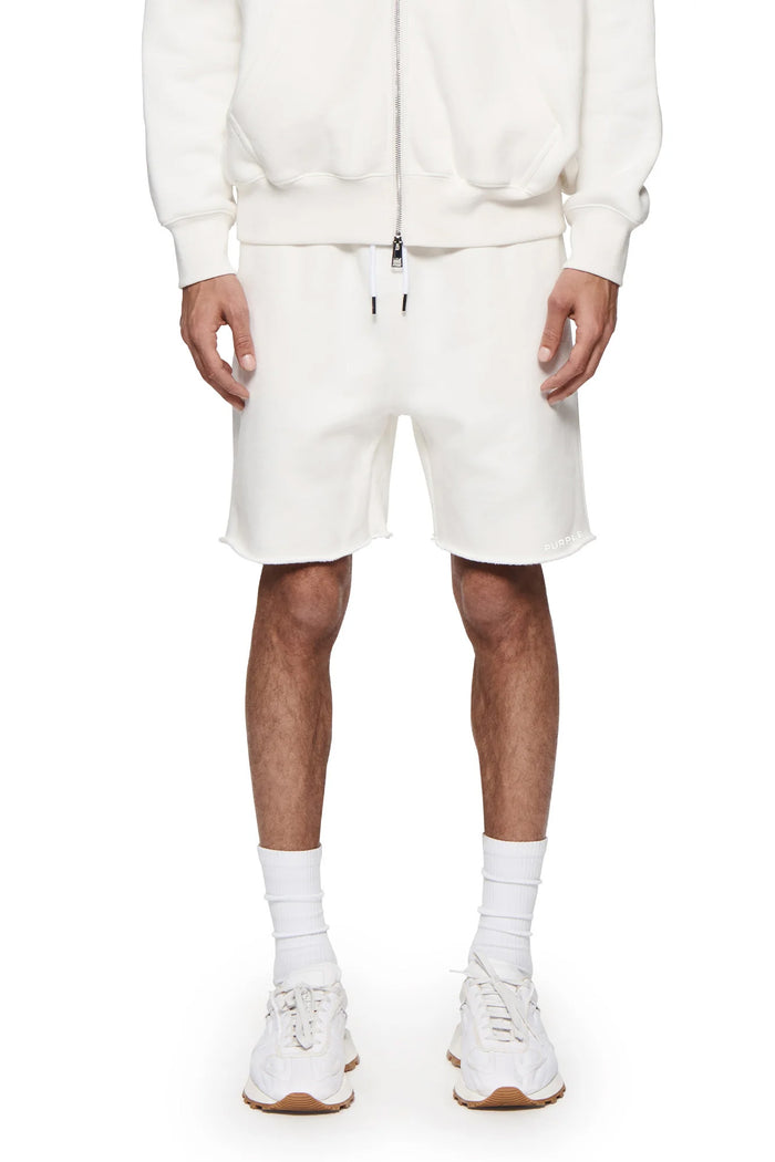 Basic Sweatshort in ivory, 100% cotton, relaxed fit, heavyweight fleece knit, raw hem.