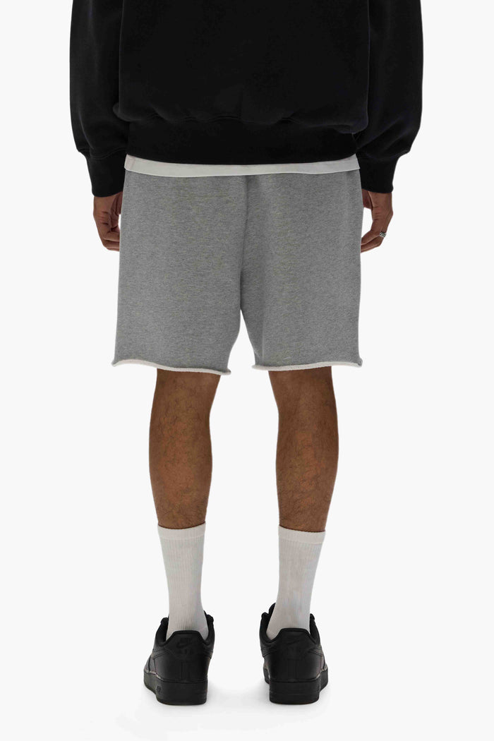 Basic Sweatshort in Purple, 100% cotton, relaxed fit, heavyweight fleece knit, raw hem.