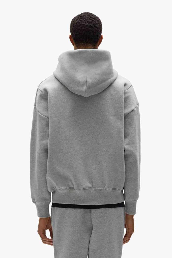 Basic Zip-Up Hoodie in purple, featuring oversized fit and white label, made from 100% cotton.