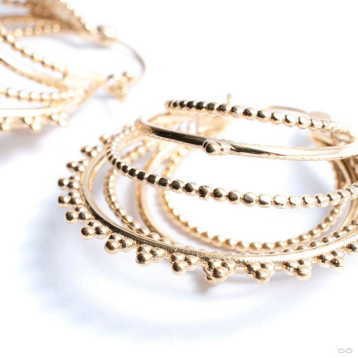 Beaded Warrior Earrings from Tawapa in yellow-gold-plated brass