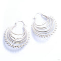Beaded Warrior Earrings from Tawapa in silver-plated white brass