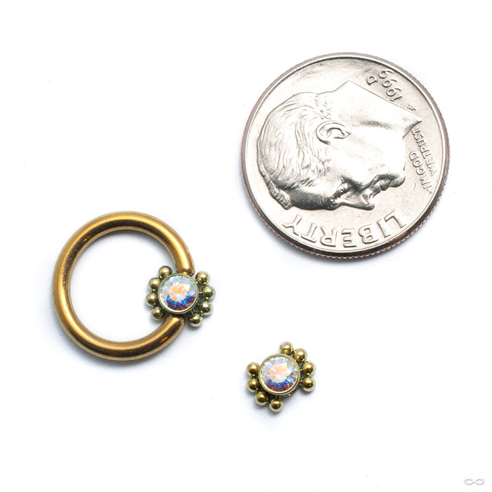 Bezel-set Captive Gem Bead with Beaded Border from LeRoi with aurora borealis shown in captive bead ring