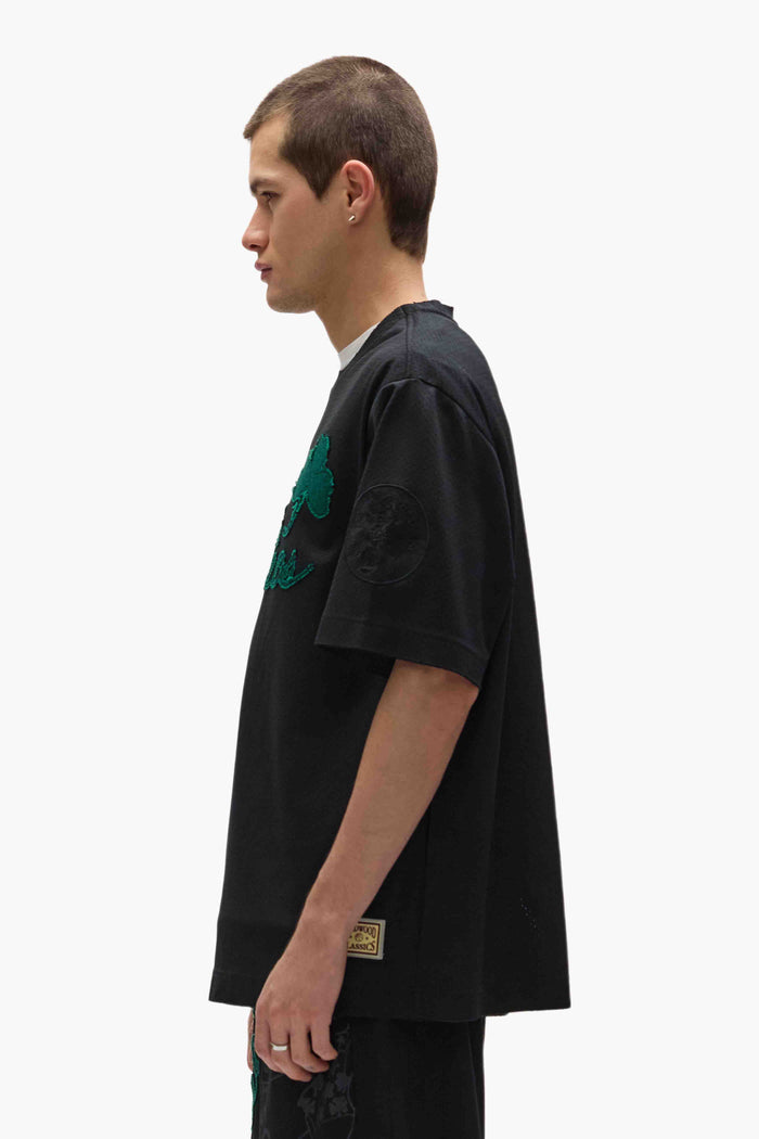 Boston Celtics Mesh Tee featuring heavyweight mesh fabric and embroidered graphics.