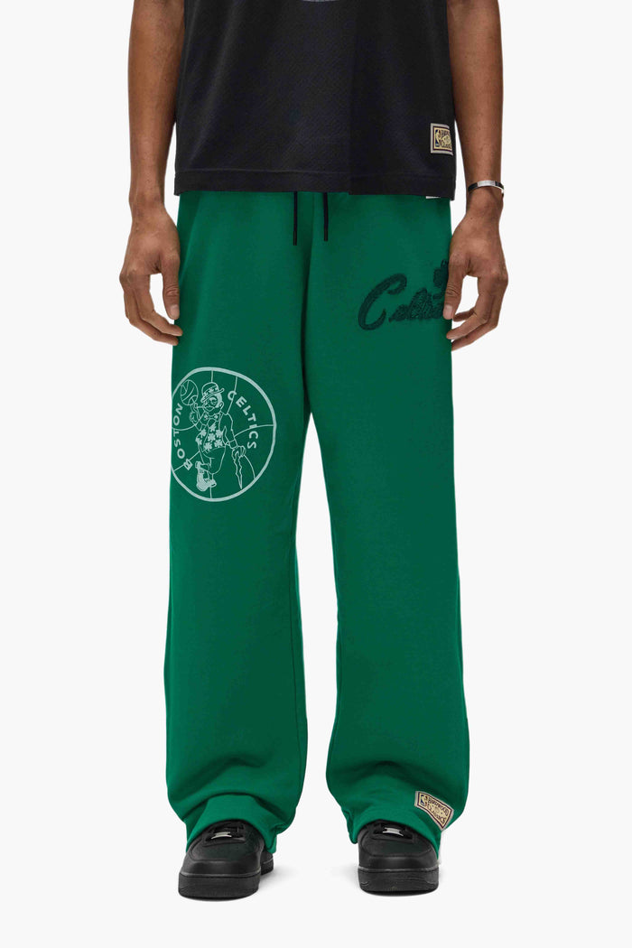 Boston Celtics Snap Pants with snap buttons, elastic waistband, and embroidered details, relaxed fit.