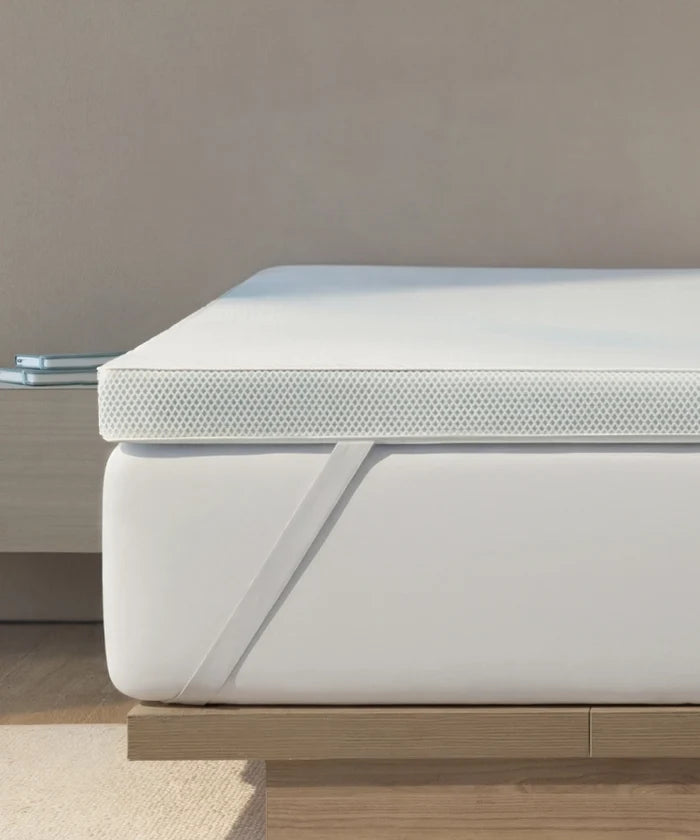 Snow white Breescape cooling mattress topper with breathable misty grey mesh for hot sleepers.