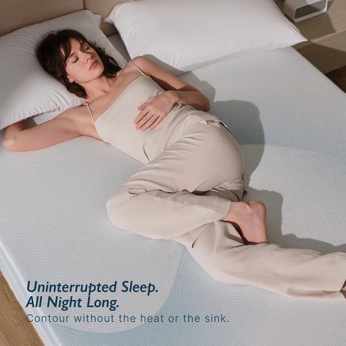 Breescape cooling mattress topper: woman sleeps soundly. Misty grey texture.