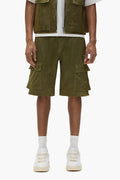 Cargo shorts in green sateen, five-pocket design, relaxed fit with utility flap pockets.