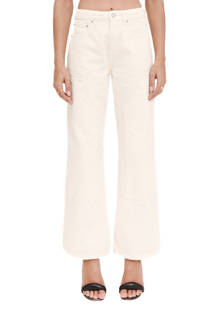 Carpenter Wide Pearl denim with carpenter panels and pearl studs, available in sizes 24-34