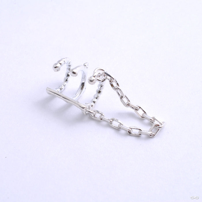 Chained Love Cuff from Tawapa in silver left ear