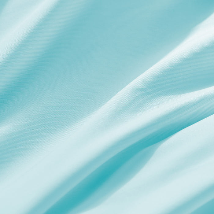 Close-up of smooth blue cooling pillowcase fabric