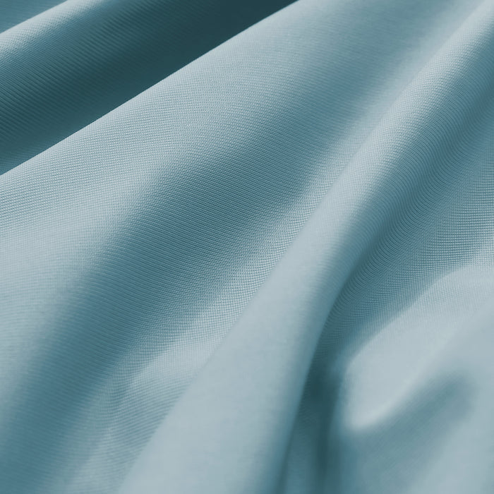 Close-up of smooth teal cooling pillowcase fabric