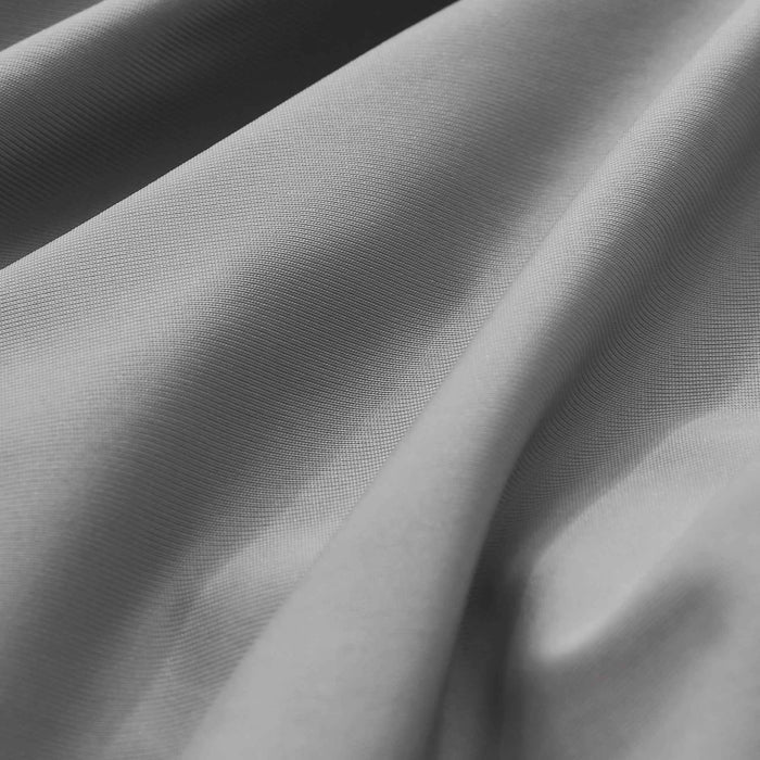 Close-up of smooth dark gray cooling pillowcase fabric