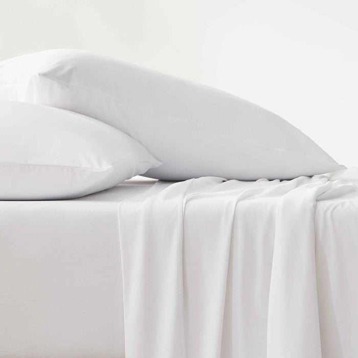 Whote cooling pillows and sheets with a smooth cool-to-the-touch finish