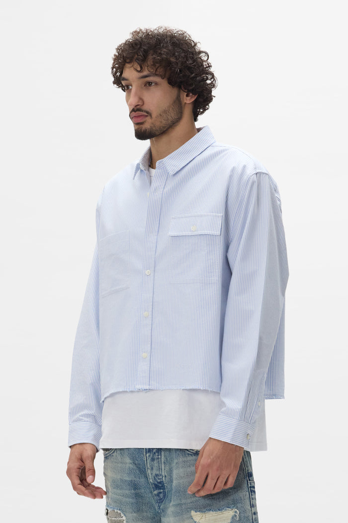 Cropped Poplin Shirt in lightweight striped poplin with button chest pocket and relaxed fit.