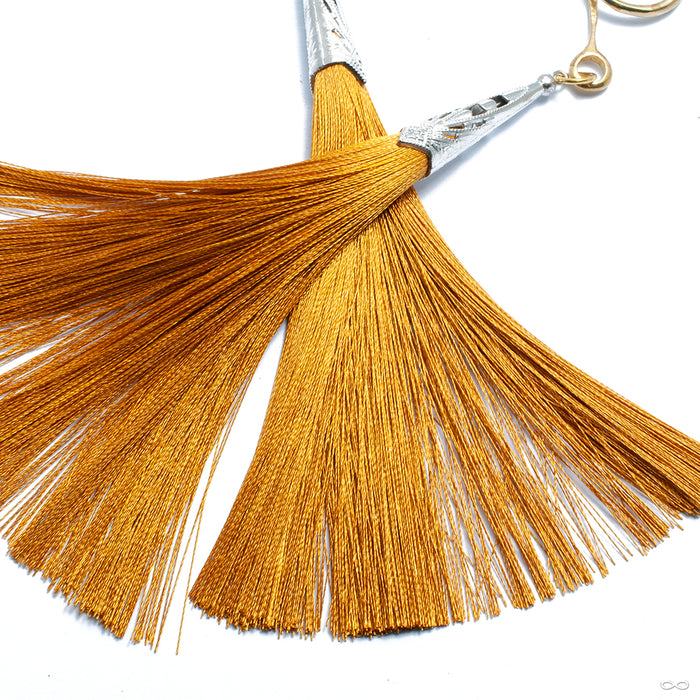 Crossover with Capped Tassel from Oracle with golden yellow tassel