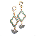 Crossover with Ornate Stamped Metal and Fan Tassel from Oracle with turquoise beads & gray tassel