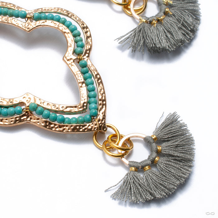 Crossover with Ornate Stamped Metal and Fan Tassel from Oracle with turquoise beads & gray tassel