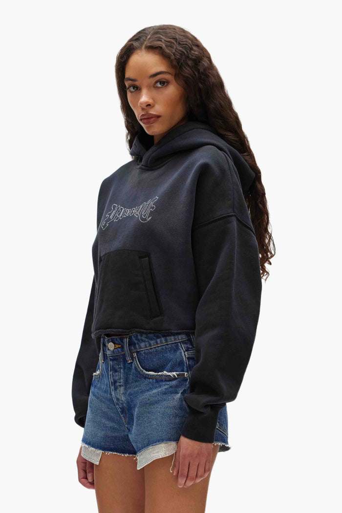 Crystal Cropped Hoodie with oversized fit, large kangaroo pocket, and raw-edged hem.