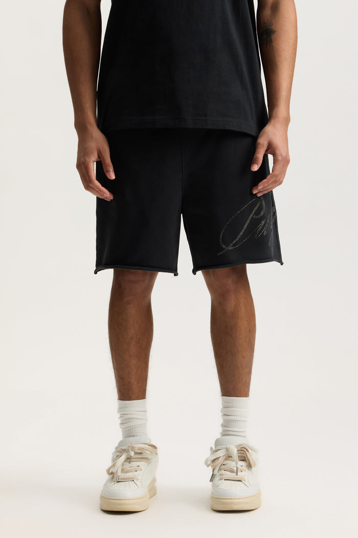 Crystal Slanted Script Short with elastic waistband, mid acid wash, and hotfix crystals.