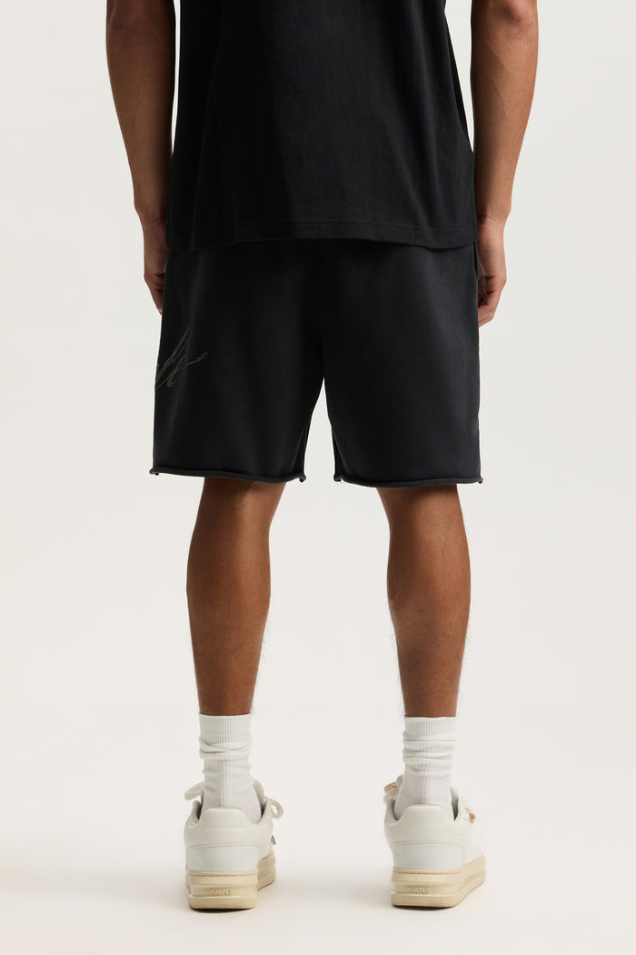 Crystal Slanted Script Short with hotfix crystals and mid acid wash, available in various sizes.