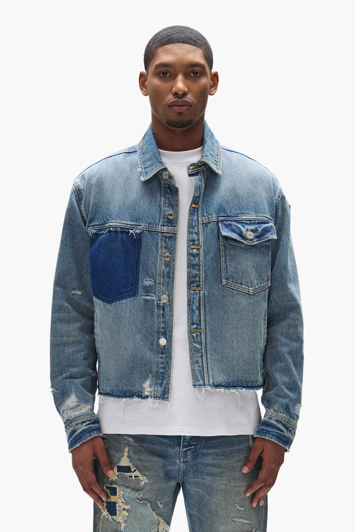 Distressed Cropped Shirt with relaxed fit, button front, shadow chest pocket, and raw cut bottom edge