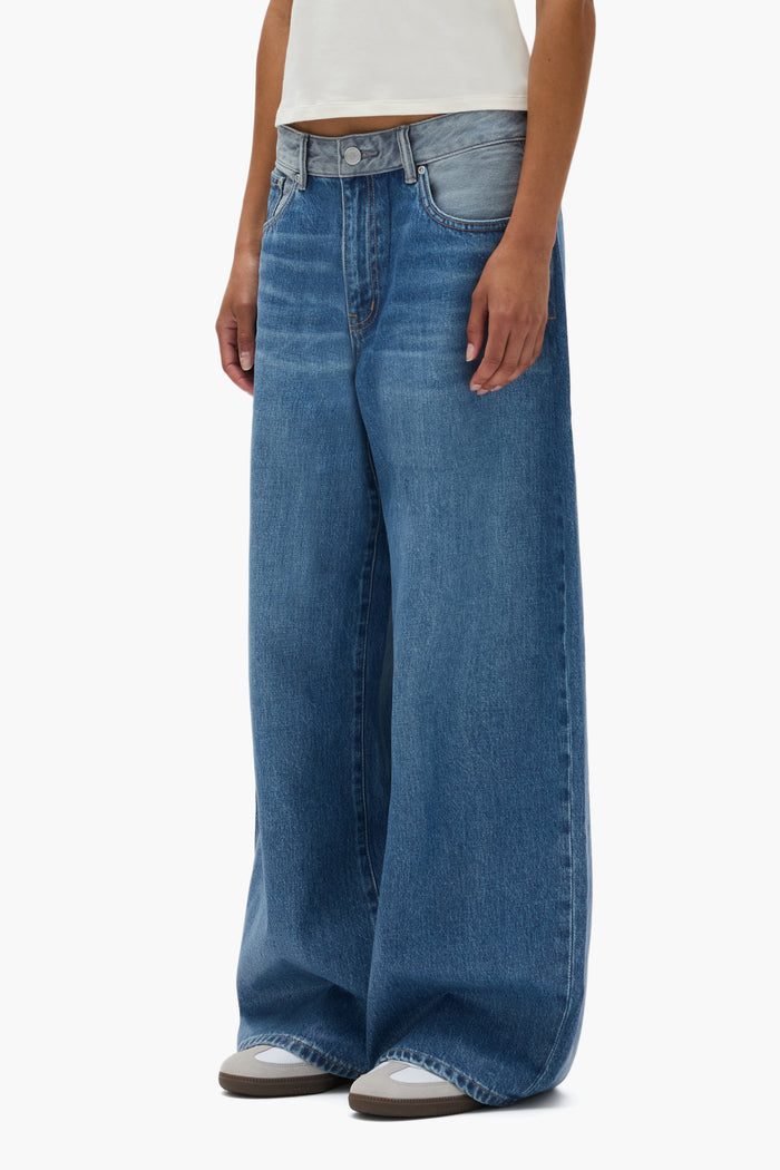 Dual Tone Baggy Denim in light indigo with low rise and five pocket style.