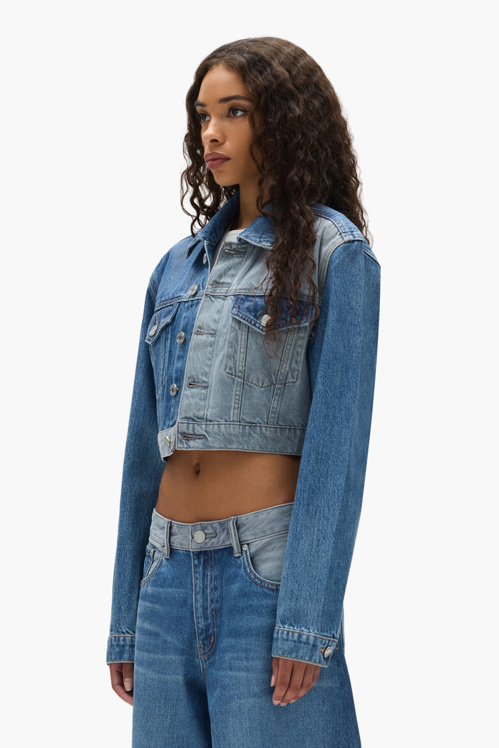 Dual Tone Cropped Jacket with front pockets, button closure, and adjustable back tabs.