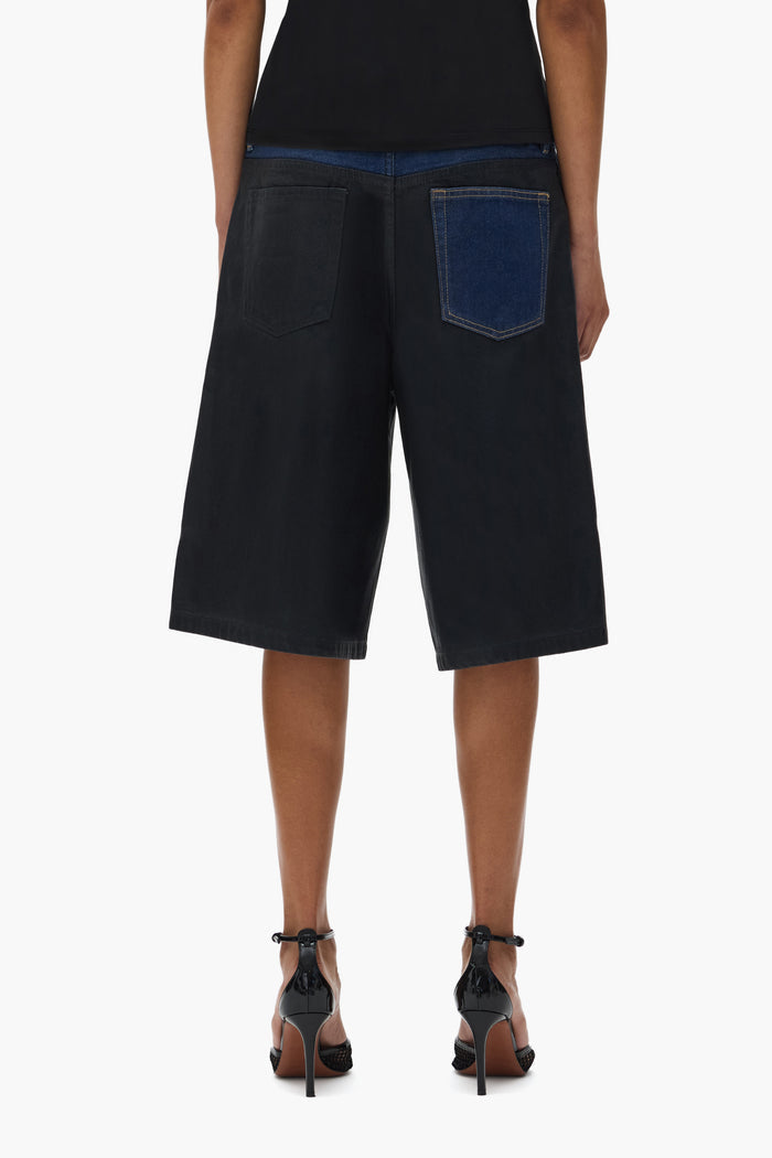 Dual Tone Short with low rise, 5 pocket style, front zipper fly, and reinforced belt loops.