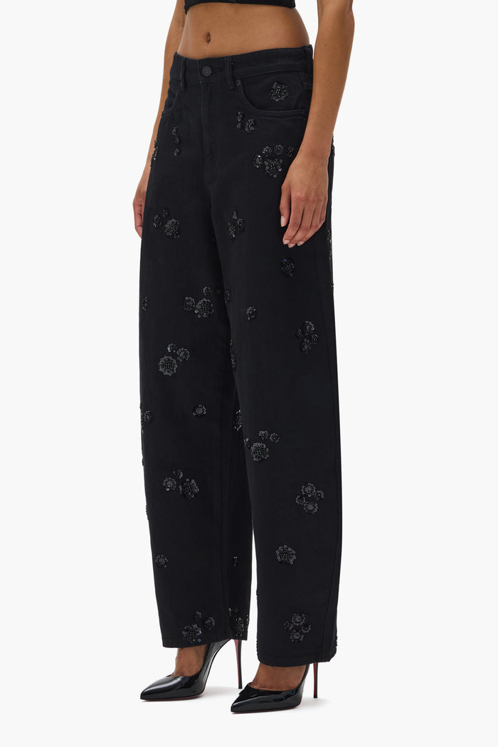 Embellished Barrel Leg Denim with sequin embroidery and four-pocket style, inseam 33".