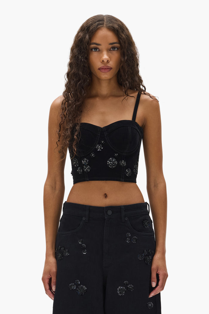 Embellished Corsette bralette with floral sequin embroidery and exposed zipper closure.
