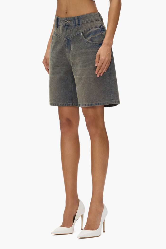 Embossed Logo Short in white, low rise, loose fit, mid-thigh length, 5 pocket styling.
