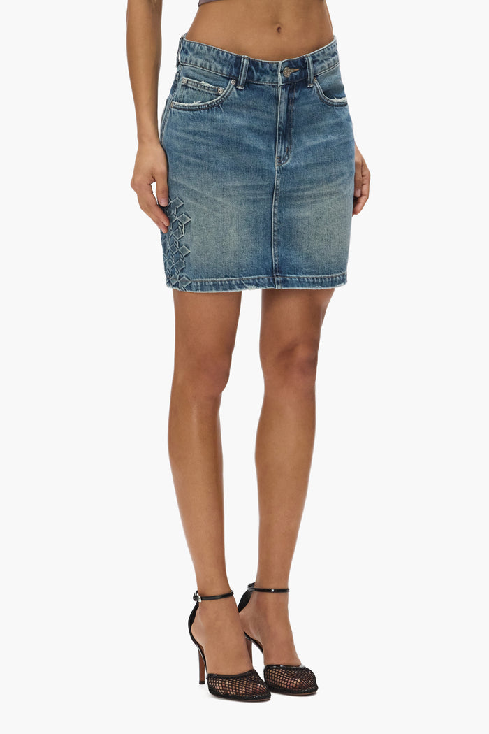 Embossed Monogram Mini Skirt in high rise relaxed fit with 5 pocket styling.
