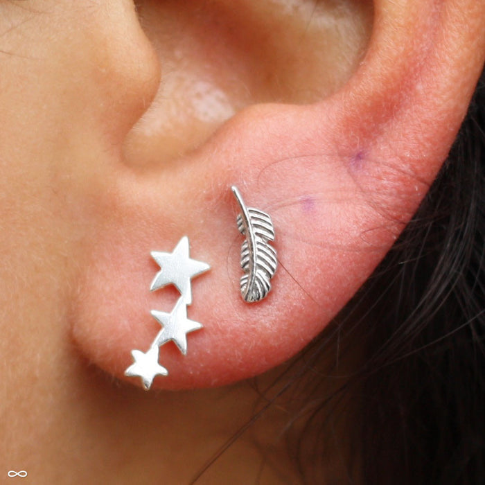 Earlobe piercing with Feather Press-fit End in Gold from BVLA in 14k White Gold