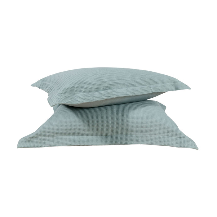 Two pillow shams on a white background. #color_harbor island