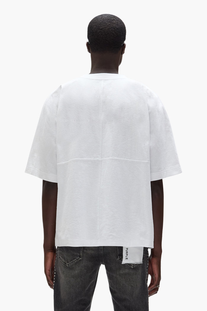 Force Majeure Tee in white, short sleeved, with colorful Purple Brand graphic on chest.