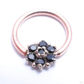 Forward-Facing Fleurette Fixed Bead Ring in Gold from Scylla with black spinel