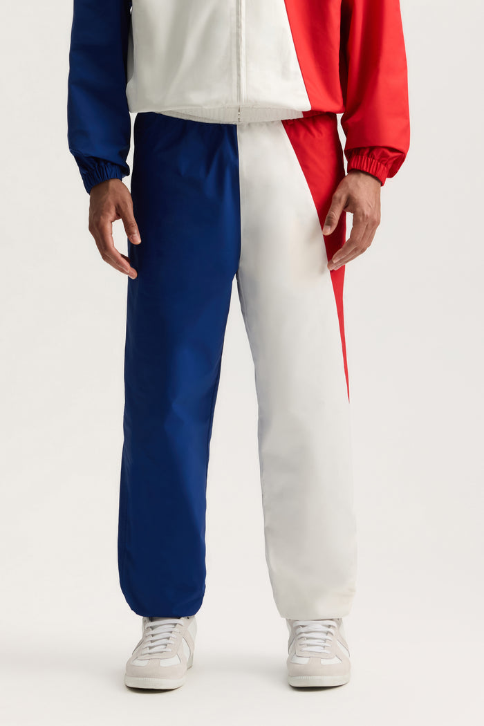 France All Around Pant in relaxed fit with waistband drawcord and welt zipper pocket.
