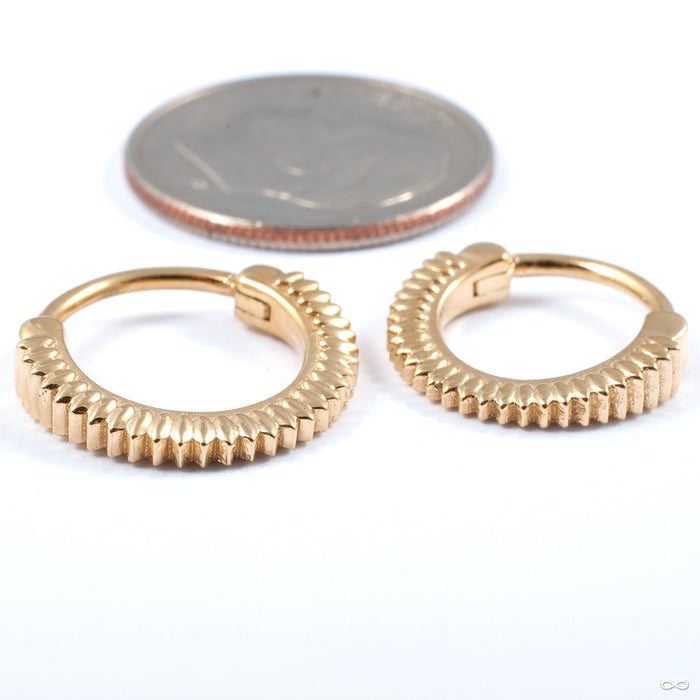 Giger Clicker from Tether Jewelry side view in yellow gold