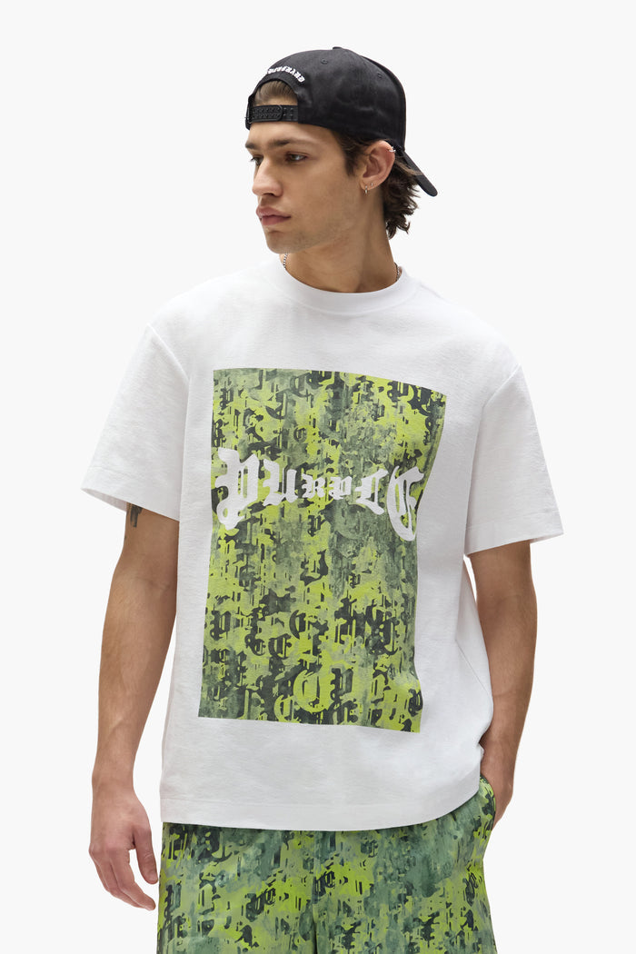 Gothic Camo Tee in regular fit with digital camo print and gothic purple lettering.