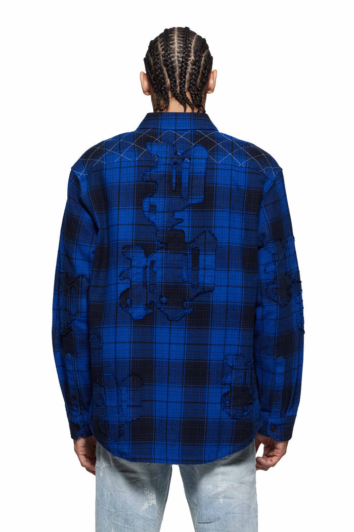Gothic P Flannel Shirt in black and blue plaid with double flap pockets and curved hem